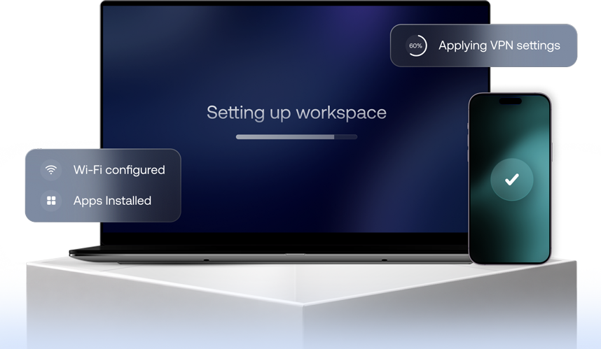 Laptop and smartphone being set up automatically, showing Hexnode UEM device and user provisioning from first boot.